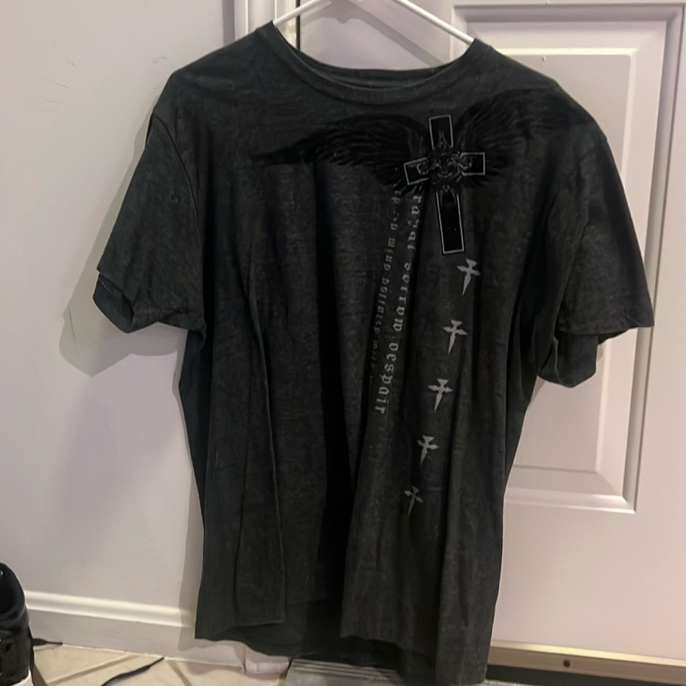 The raw uncut tee shirt
